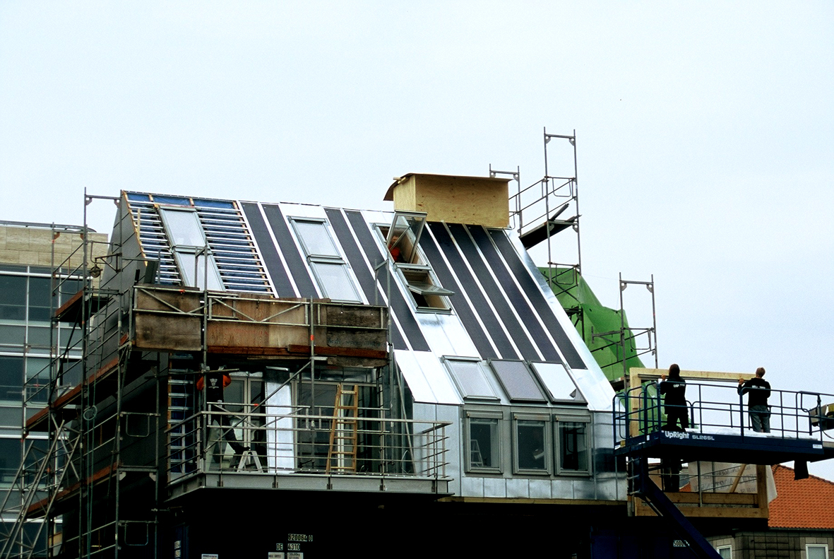 Takbolig for flate tak i Horsens.