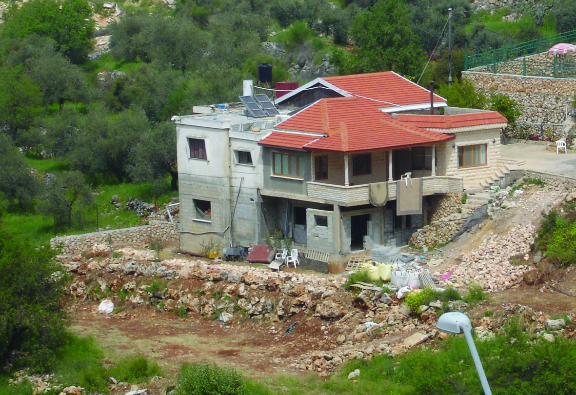 Fra Hollow Land: Hus i en palestinsk landsby.